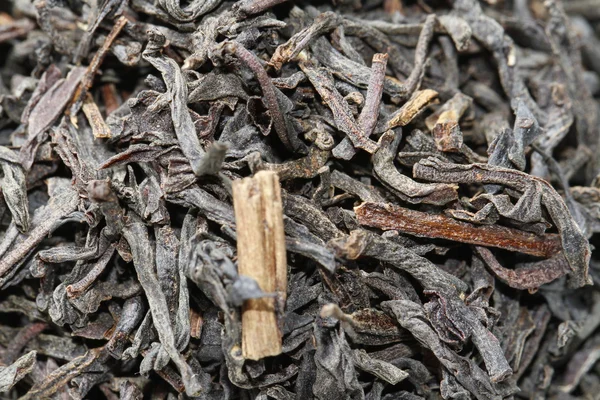 Czarna herbata liście z zapałem pomarańcza bergamota — Zdjęcie stockowe