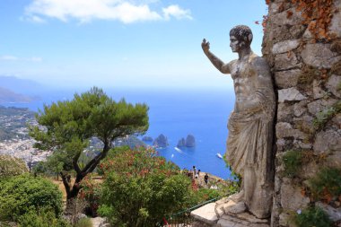 Spectacular View of Sea Cliffs and Coastline to the Faraglioni Rocks from Monte Solaro, Island of Capri in Italy clipart
