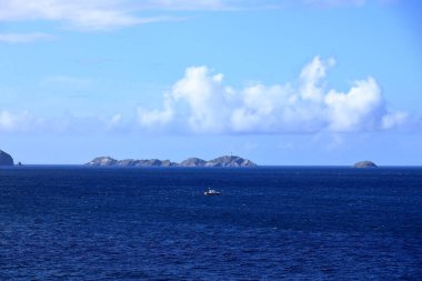distant view to the north coast of the Shetland Islands (Unst island, Muckle Flugga Lighthouse), Scotland