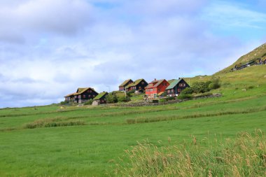 the picturesque coastal village Kirkjubour at the Faroe Islands, Streymoy, Denmark