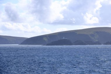 distant view to the north coast of the Shetland Islands (Unst island, Muckle Flugga Lighthouse), Scotland