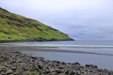 Risin and Kellingin, the giant and the witch, view from Tjornuvik, Streymoy, Faroe Islands in Denmark