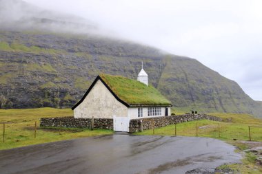 the church near the Saksun Heritage Farm with grass roofs, Streymoy, Faroe Islands, Denmark