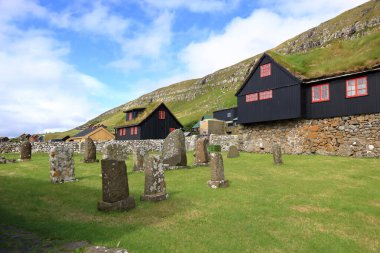 the village of Kirkjubour, famous for the ruins of an ancient cathedral, Kirkjubomururin, on the island of Streymoy, Europe, Faroe Islands in Denmark
