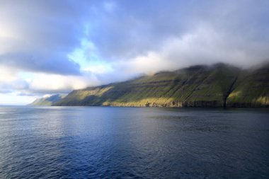a view to the island of Kalsoy from the sea, Faroe Islands, Denmark
