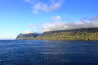 a view to the island of Kalsoy from the sea, Faroe Islands, Denmark