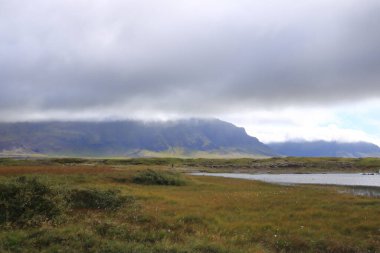 İzlanda 'daki Snaefellsnes yarımadası - 31 Ağustos 2025: Landbrotalaug Kaplıcasında bir adam