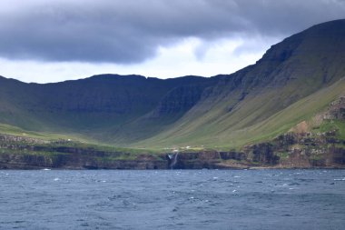 Waterfall at the Vagar island at Faroe Islands in Denmark