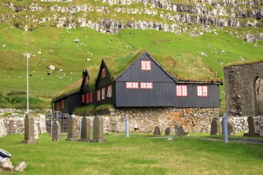 the village of Kirkjubour, famous for the ruins of an ancient cathedral, Kirkjubomururin, on the island of Streymoy, Europe, Faroe Islands in Denmark