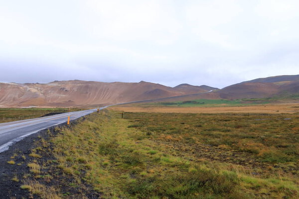around the Hverir geothermal area with boiling mudpools and steaming fumaroles in Iceland, also known as Hverarond