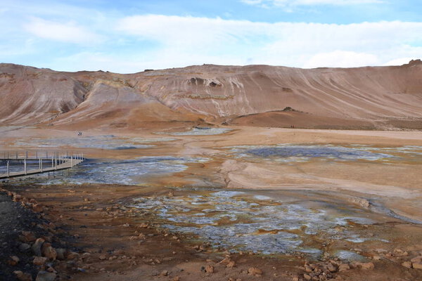 Hverir geothermal area with boiling mudpools and steaming fumaroles in Iceland, also known as Hverarond
