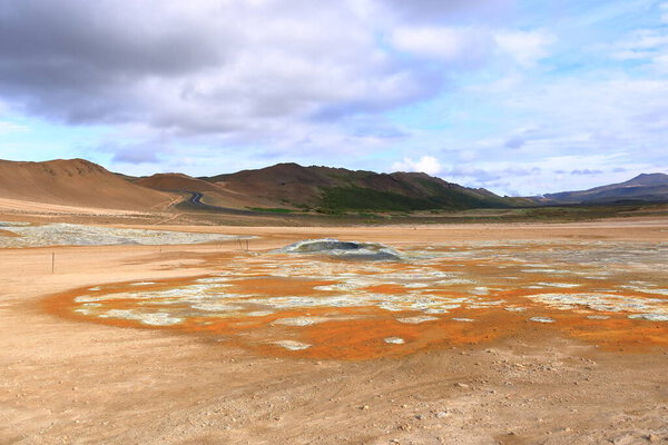 Hverir geothermal area with boiling mudpools and steaming fumaroles in Iceland, also known as Hverarond