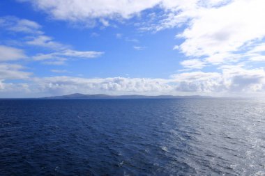 distant view to the north coast of the Shetland Islands (Unst island, Muckle Flugga Lighthouse), Scotland