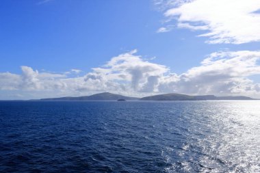 distant view to the north coast of the Shetland Islands (Unst island, Muckle Flugga Lighthouse), Scotland