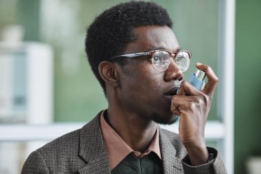 African man has asthma clipart