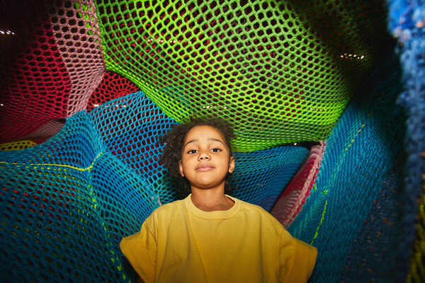 Child playing in indoor playground