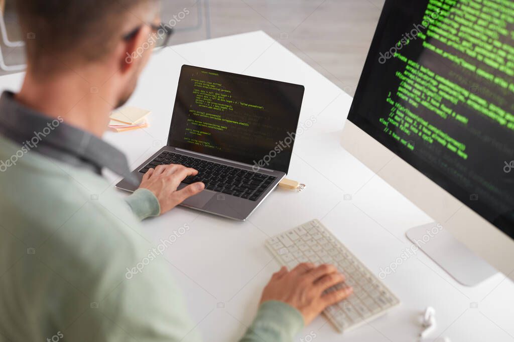 Programmer working on computer