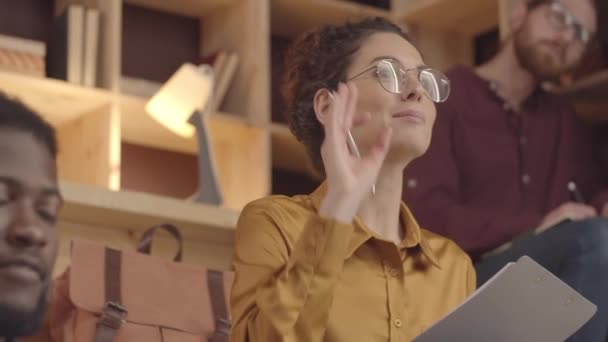 Tilting Close Shot Diverse Group Young People Sitting Benches Hipster — Stock Video