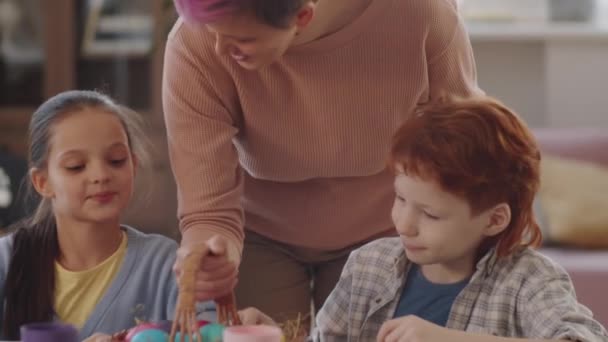 Happy Mother Bringing Basket Colorful Dyed Eggs Little Daughter Son — Stock Video