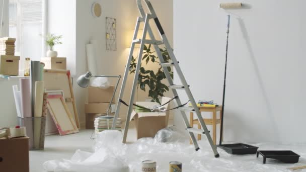 Tracking Shot Empty Room Apartment Renovation Buckets Paint Stepladder Home — Stock Video