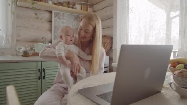 Happy Mother Baby Daughter Arms Smiling Waving Laptop Camera While — Stock Video