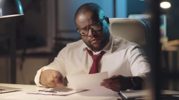 Tired Afro American Businessman Reading Documents Taking Glasses Rubbing His — Stock Video