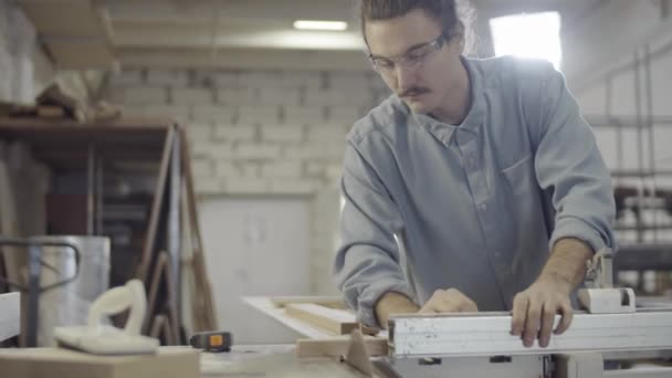 Waist Shot Young Caucasian Craftsman Transparent Goggles Positioning Carefully Cutting — Stock Video