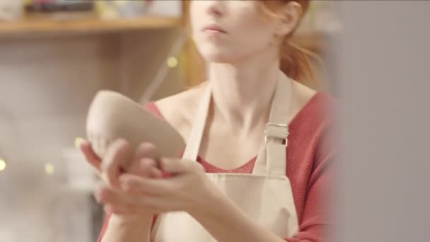 Chest Shot Young Caucasian Woman Red Hair Standing Pottery Workshop — Stock Video