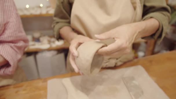 Zooming Close Shot Hands Anonymous Woman Apron Making Clay Bowl — Stock Video