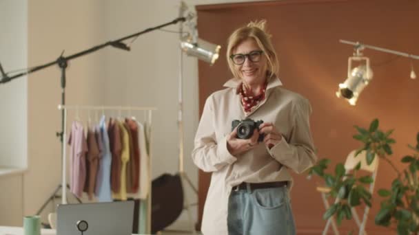 Medium Shot Senior Female Photographer Stylish Outfit Standing Photo Studio — Stock Video