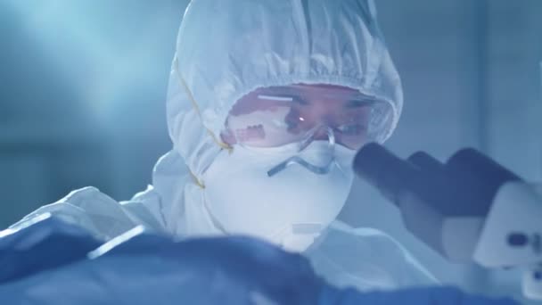 Tilt Shot Female Asian Lab Scientist Protective Mask Suit Gloves — Stock Video