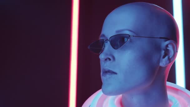 Portrait Young Bald Woman Trendy Eyeglasses Glowing Tubes Her Neck — Stock Video