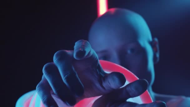 Studio Shot Young Bald Woman Glowing Neon Tubes Wrapped Wrists — Stock Video