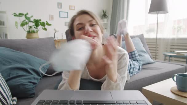 Young Happy Woman Taking Medical Face Mask Smiling Telling Something — Stock Video