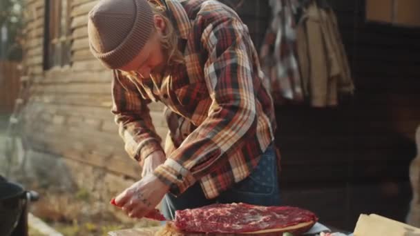 Tilt Shot Bearded Man Cutting Piece Beef Meat Knife Cooking — Stock Video