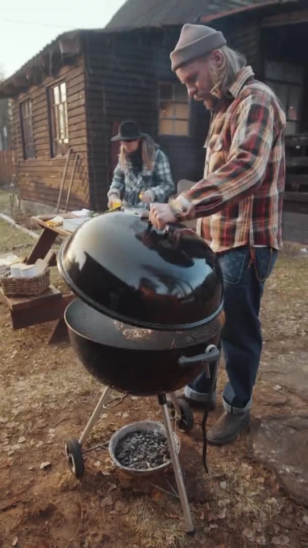 Vertical Format Footage Man Taking Lid Frim Bbq Grill Turning — Stock Video