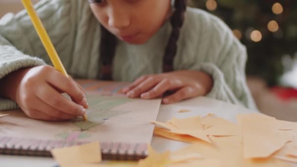 Tilt Shot Afro American Girl Drawing Christmas Tree Paper Table — Stock Video