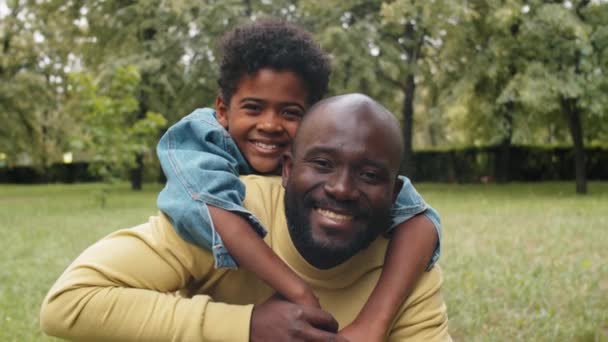 Portrait Happy Afro American Boy Embracing His Father Posing Together — Stock Video