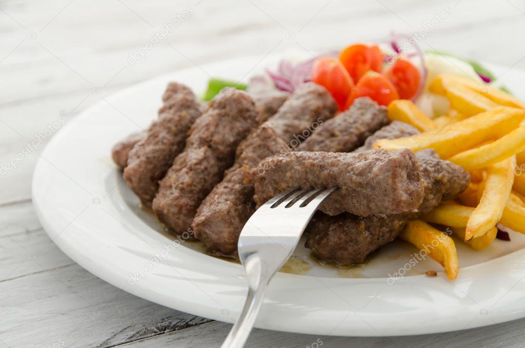 Rolled minced meat with vegetables