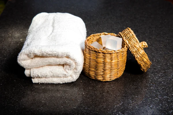 Soap in a basket and towel — Stockfoto