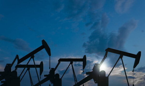 Silhouette of an oil production company. Natural resource extraction. Oil rigs against the evening sky. Oil export. Fuel industry. Global energy market.