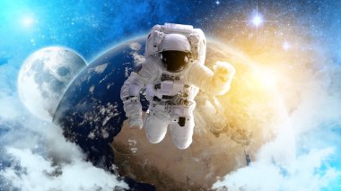 Dünya 'nın dış uzayında bir astronot. Soyut duvar kağıdı. Uzay adamı. Bu görüntünün elementleri NASA tarafından desteklenmektedir.