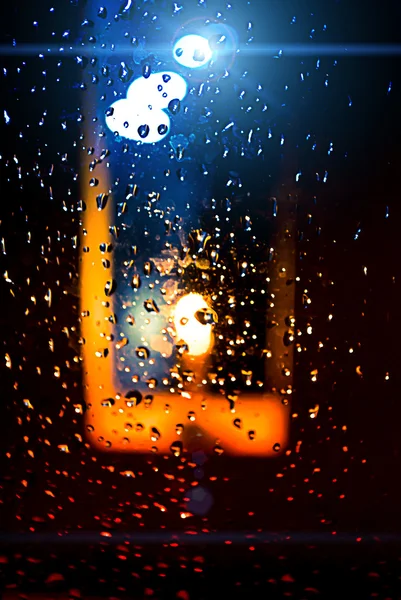 Wassertropfen mit Kerzenlicht — Stockfoto
