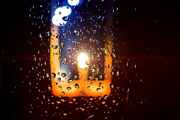 Gocce d'acqua con luce a candela — Foto Stock