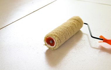 brushes and rollers for paint on wall 