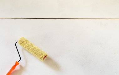 brushes and rollers for paint on wall 