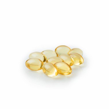 Group of capsules with fat isolated on white background. Fish oil, omega supplement and cbd extract cannabis.