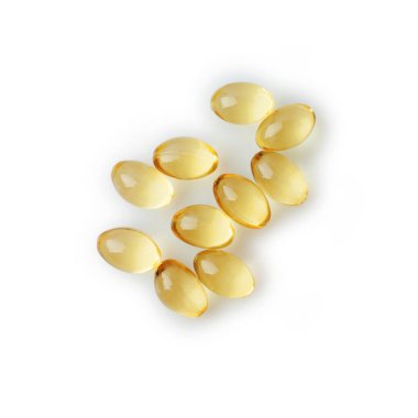 Group of capsules with fat isolated on white background. Fish oil, omega supplement and cbd extract cannabis.