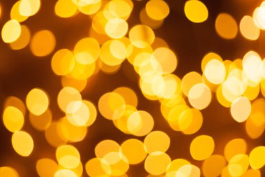 Şenlikli çelenk Bokeh arka planı çözüldü. Tebrik kartları ve kartpostallar için arka plan. Yuvarlak top. Yuvarlak bokeh ışığı.