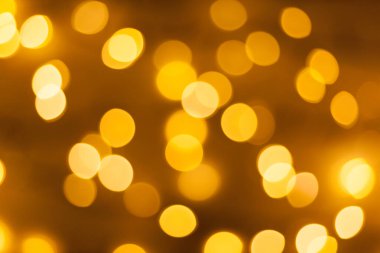 Şenlikli çelenk Bokeh arka planı çözüldü. Tebrik kartları ve kartpostallar için arka plan. Yuvarlak top. Yuvarlak bokeh ışığı.